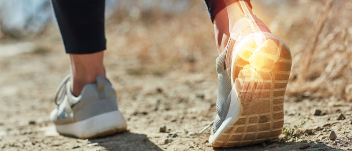 Woman foot highlighting heel pain